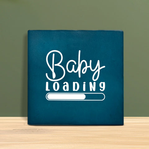 Tegeltje met tekst - Baby loading.